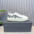 AMIRI White & Black Star Low-Top Sneakers with Cream Sole