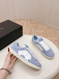 AMIRI Light Blue Low-Top Sneakers with White Star Panels