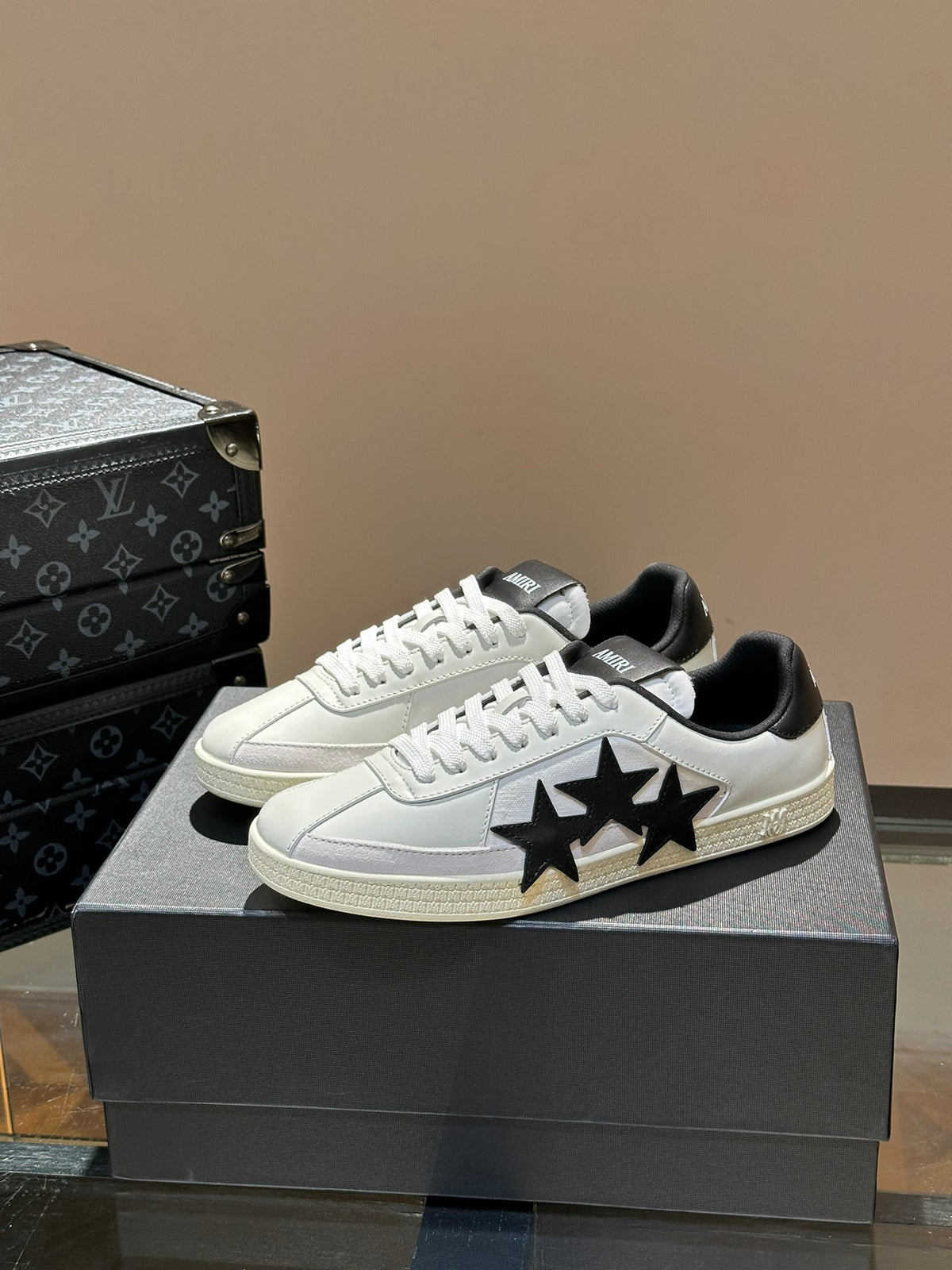 AMIRI White Low-Top Sneakers with Black Star Details