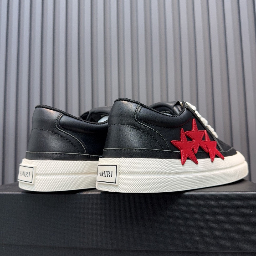AMIRI Black Low-Top Sneakers with Red Stars and White Sole
