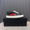 AMIRI Black Low-Top Sneakers with Red Stars and White Sole