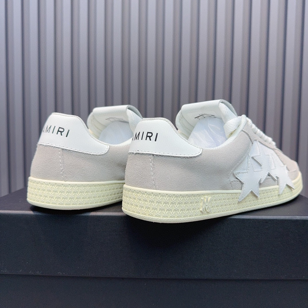 AMIRI Light Grey Low-Top Sneakers with White Stars and Cream Sole