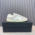 AMIRI Light Grey Low-Top Sneakers with White Stars and Cream Sole