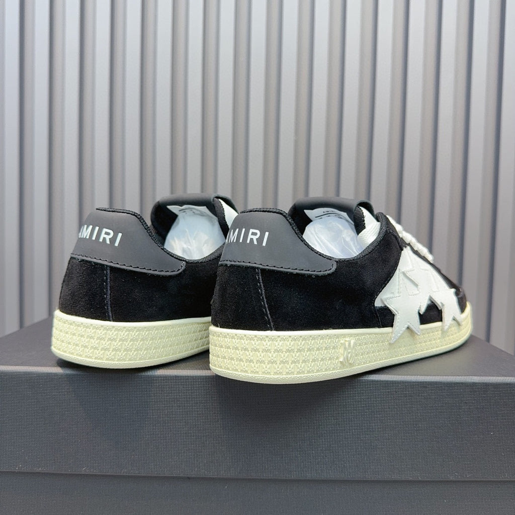 AMIRI Black Low-Top Sneakers with White Stars and Cream Sole