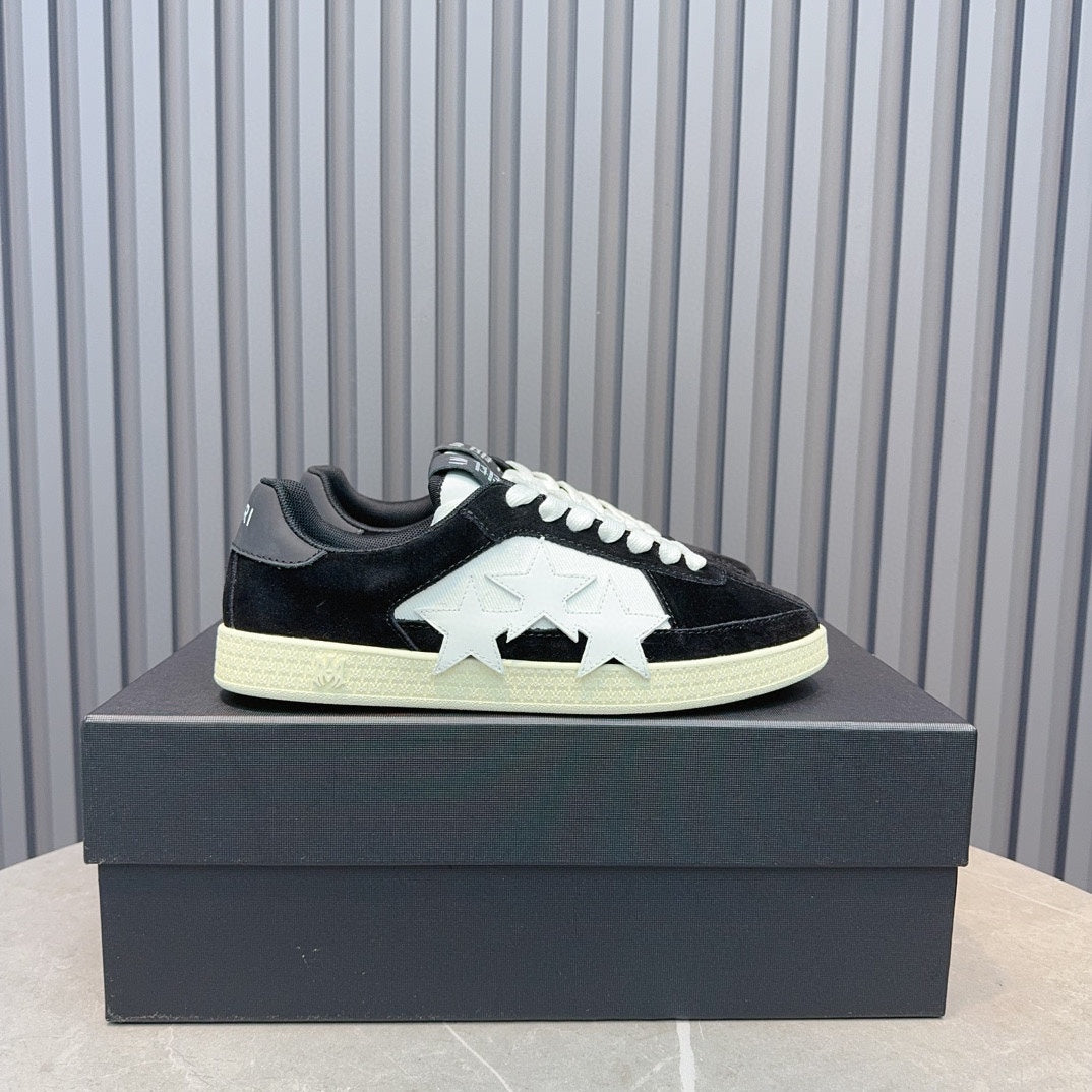 AMIRI Black Low-Top Sneakers with White Stars and Cream Sole