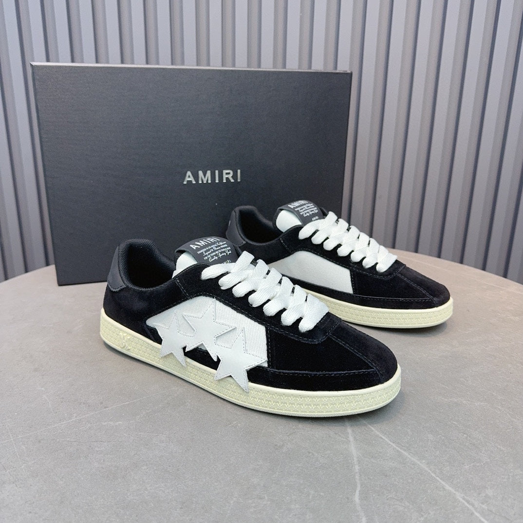 AMIRI Black Low-Top Sneakers with White Stars and Cream Sole