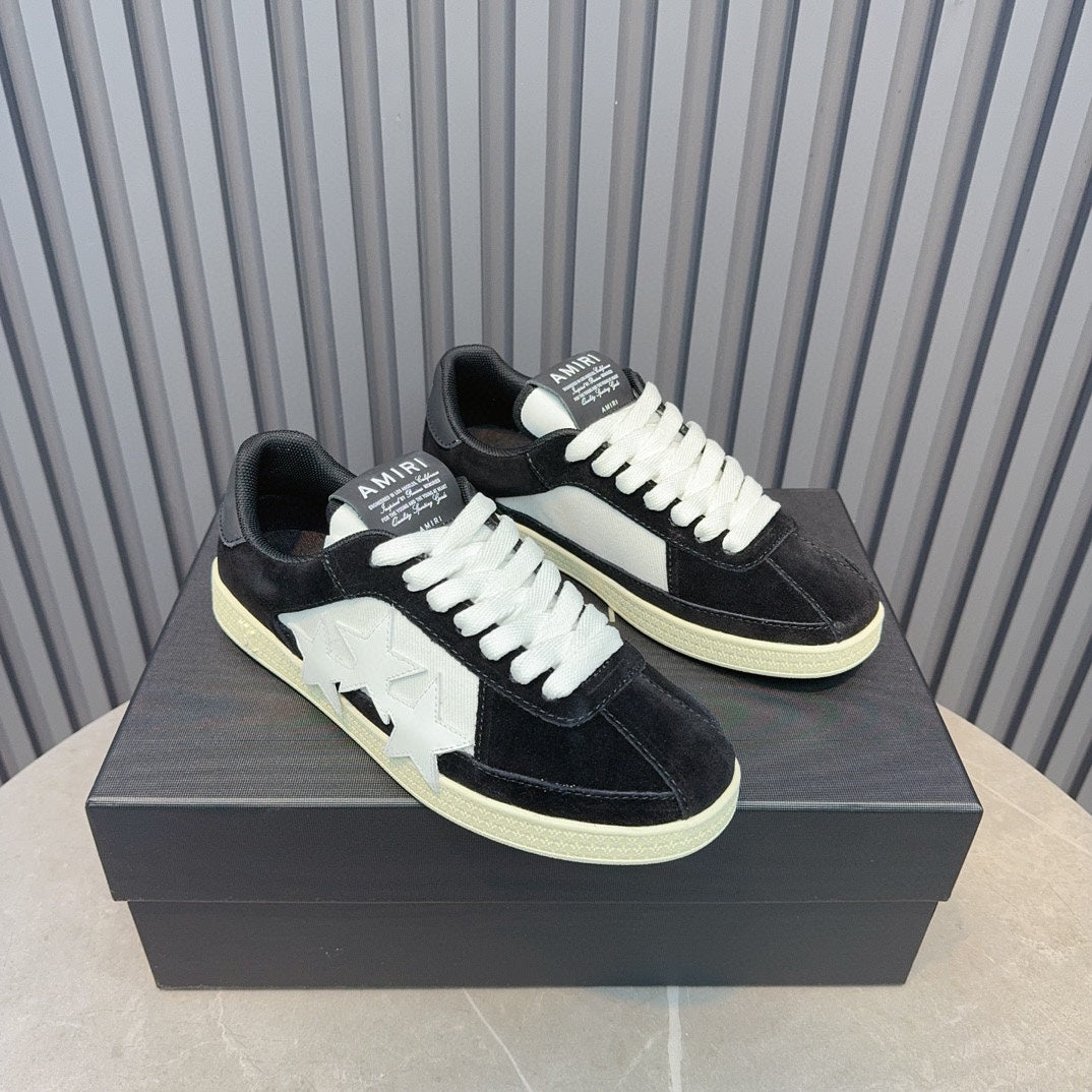 AMIRI Black Low-Top Sneakers with White Stars and Cream Sole