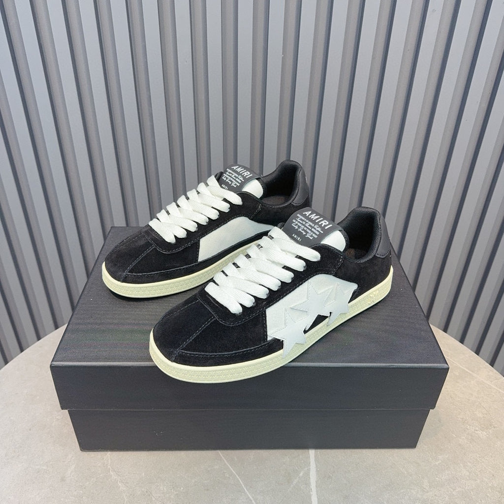 AMIRI Black Low-Top Sneakers with White Stars and Cream Sole