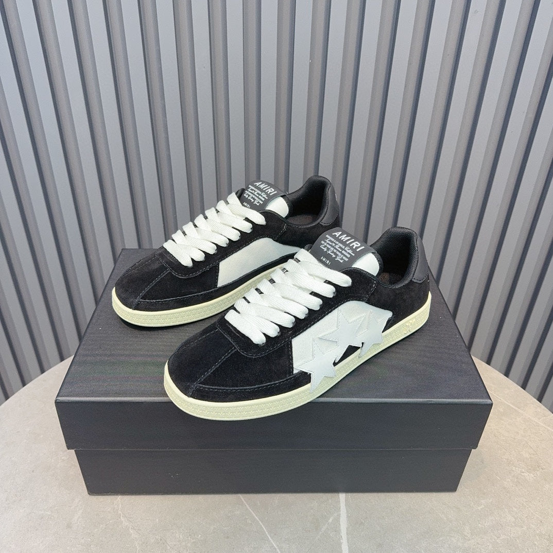 AMIRI Black Low-Top Sneakers with White Stars and Cream Sole