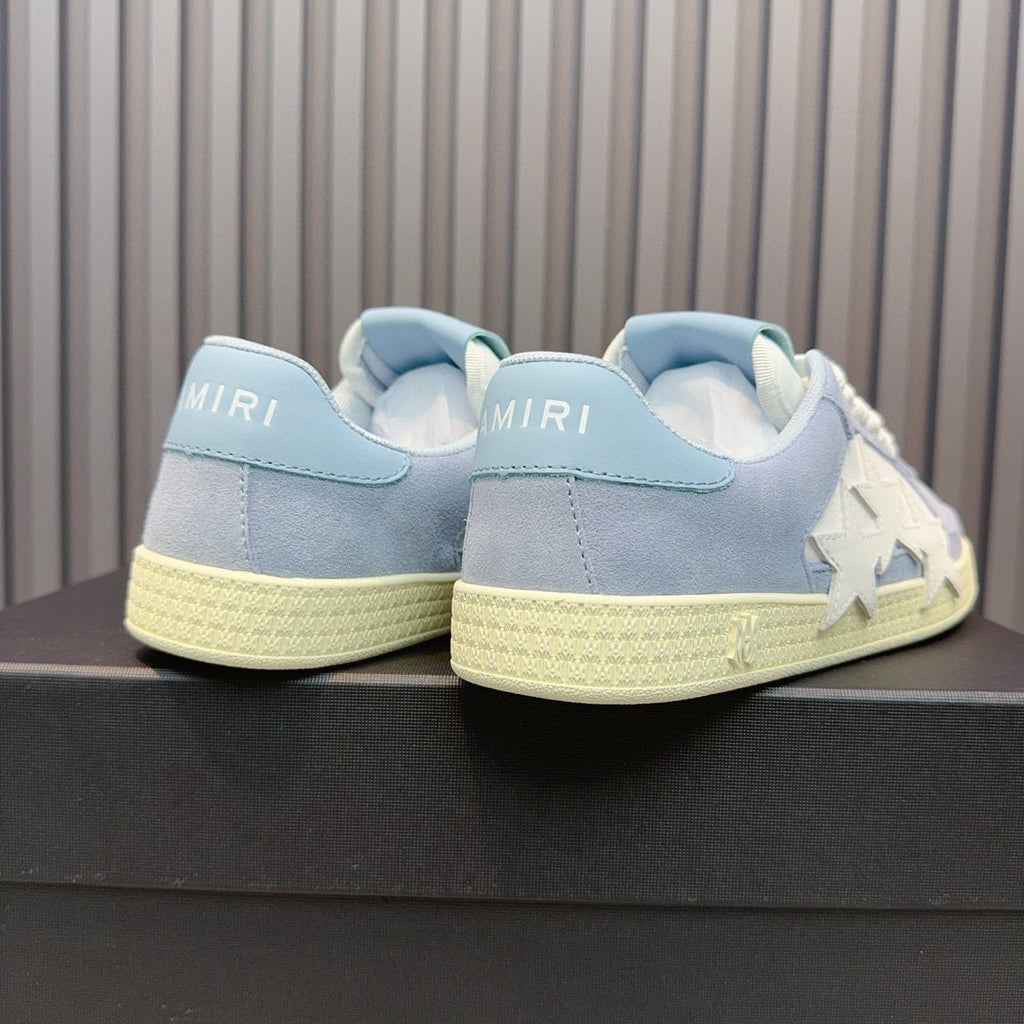 AMIRI Light Blue Low-Top Sneakers with White Stars and Cream Sole