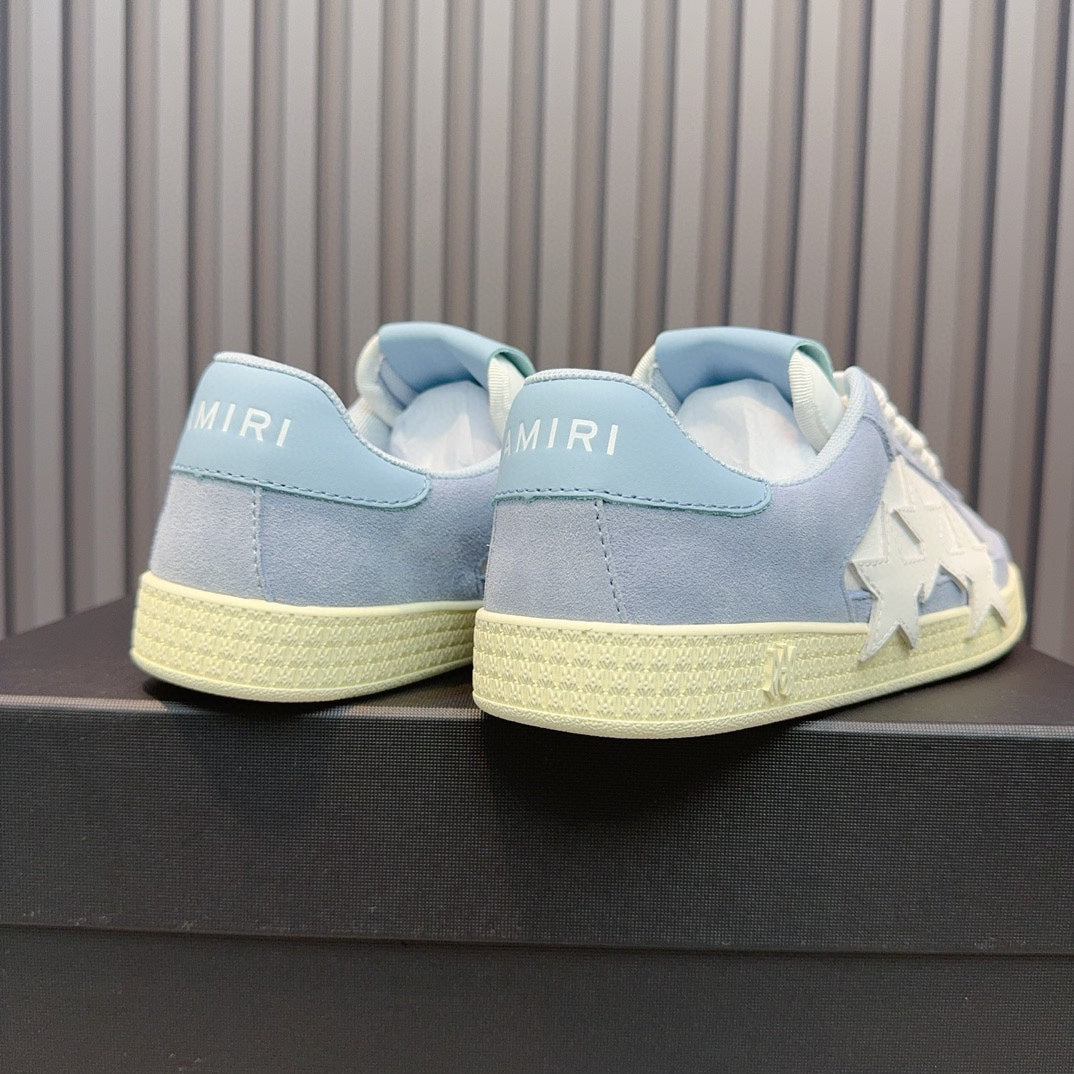 AMIRI Light Blue Low-Top Sneakers with White Stars and Cream Sole
