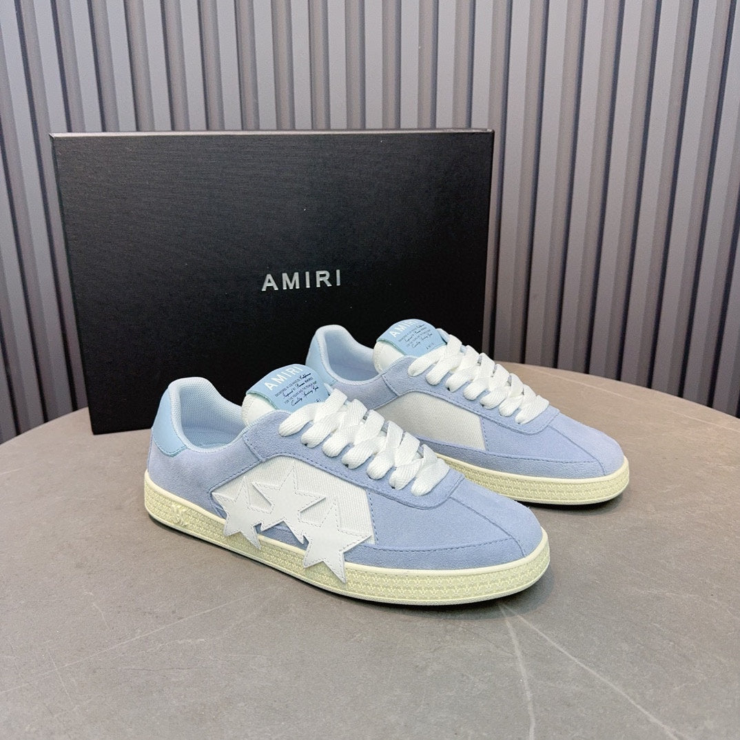AMIRI Light Blue Low-Top Sneakers with White Stars and Cream Sole