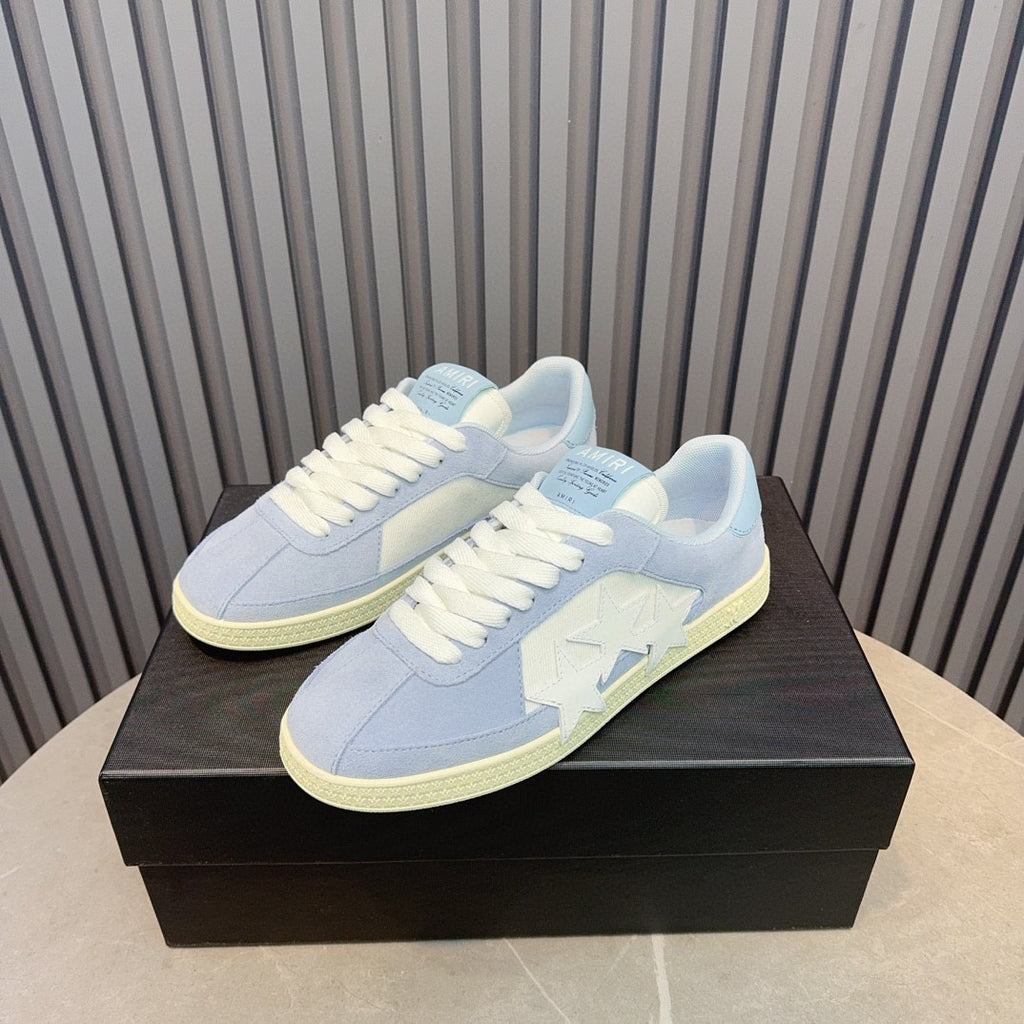 AMIRI Light Blue Low-Top Sneakers with White Stars and Cream Sole