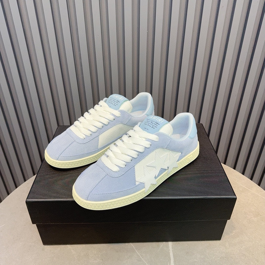 AMIRI Light Blue Low-Top Sneakers with White Stars and Cream Sole