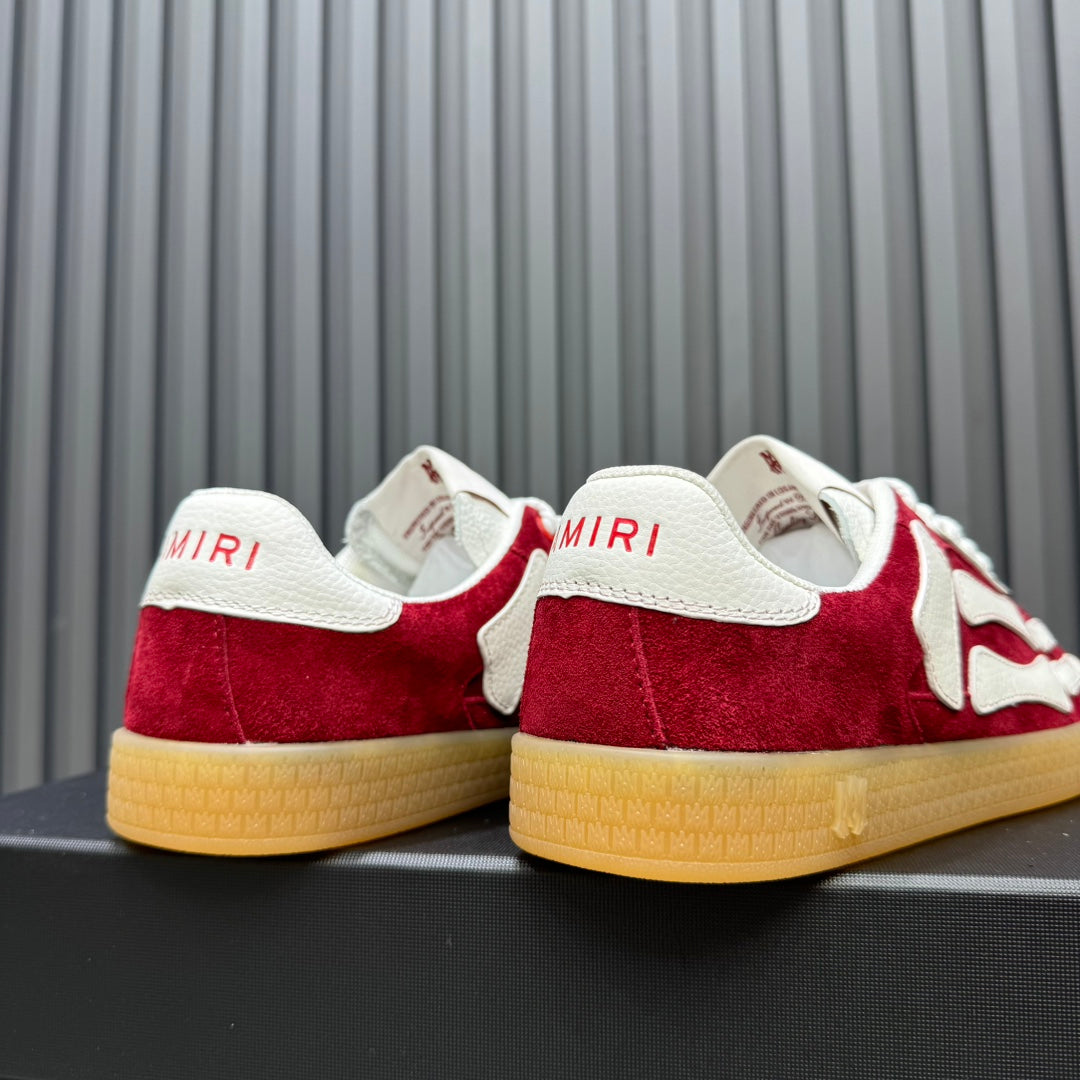 AMIRI Red Low-Top Sneakers with White Bone Details and Gum Sole