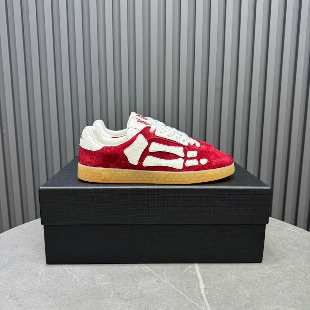 AMIRI Red Low-Top Sneakers with White Bone Details and Gum Sole