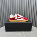 AMIRI Red Low-Top Sneakers with White Bone Details and Gum Sole