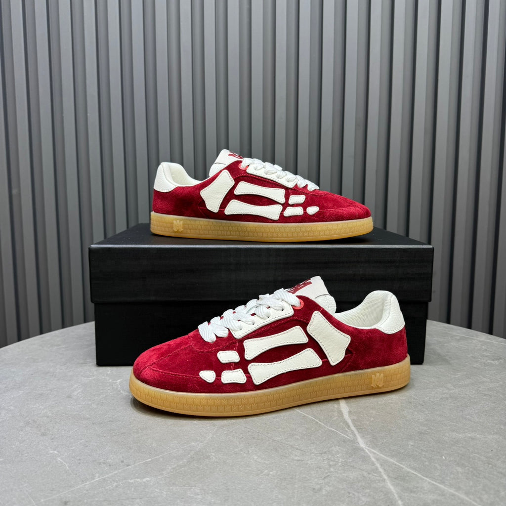 AMIRI Red Low-Top Sneakers with White Bone Details and Gum Sole
