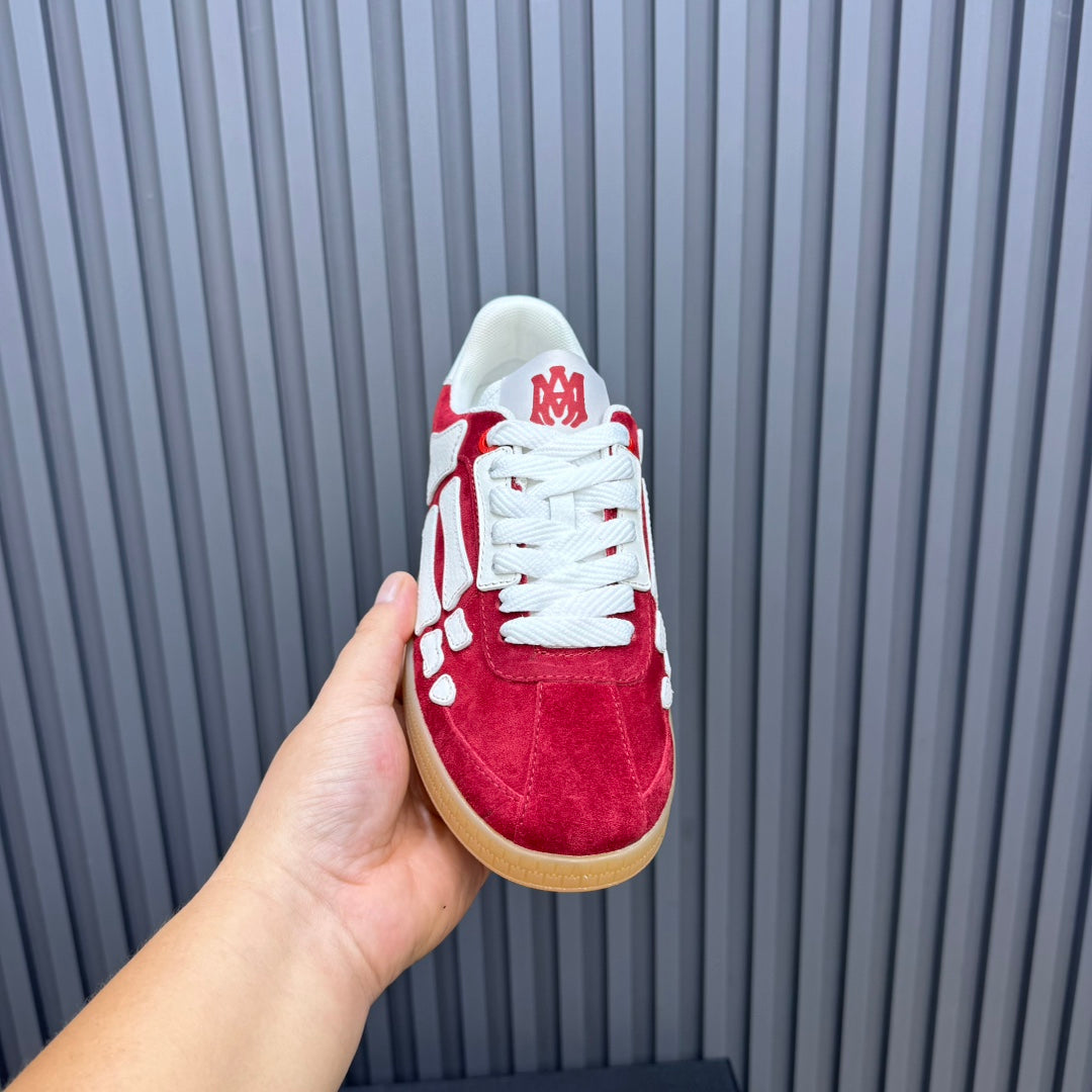 AMIRI Red Low-Top Sneakers with White Bone Details and Gum Sole