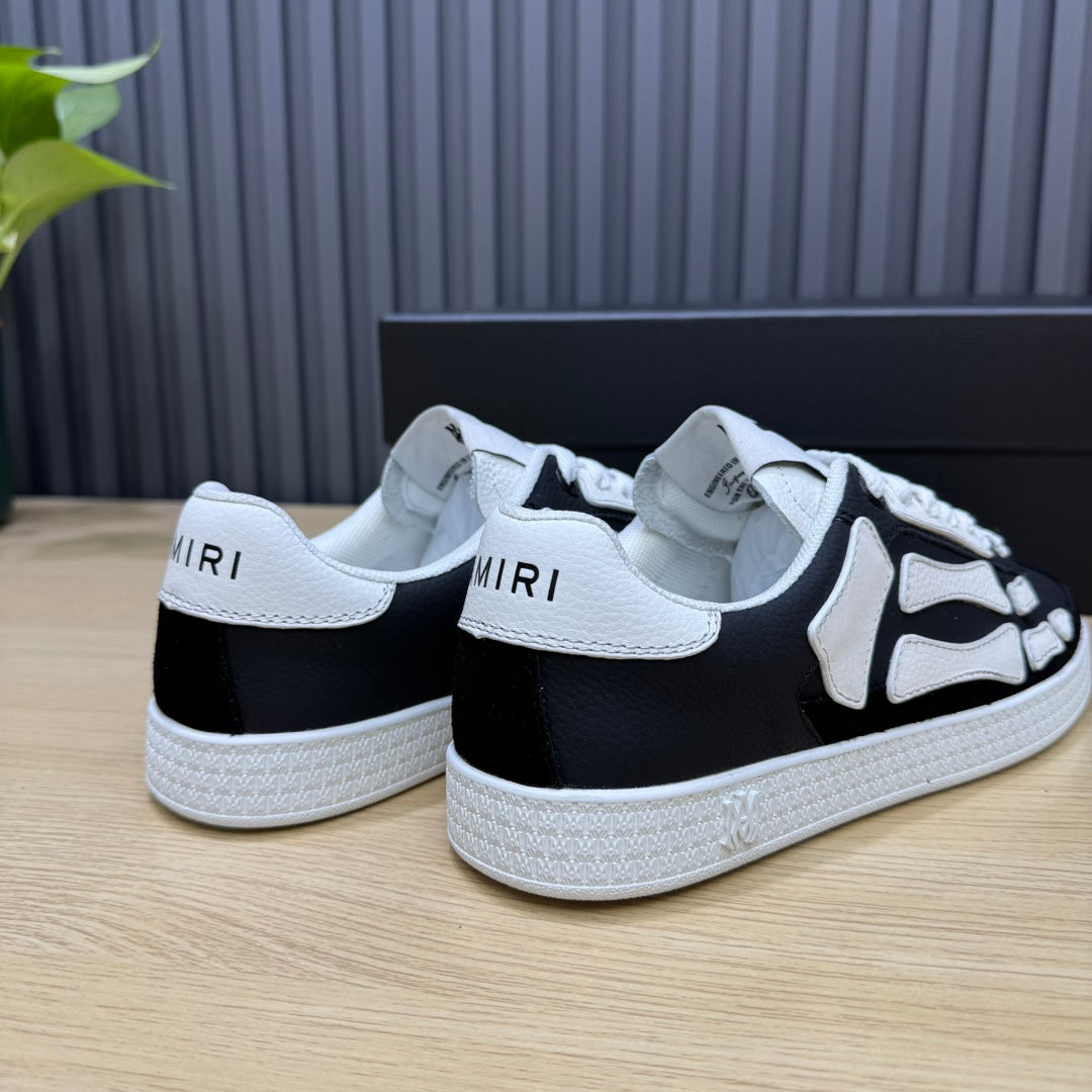 AMIRI Black Low-Top Sneakers with White Bone Details and White Sole