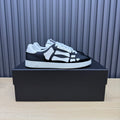AMIRI Black Low-Top Sneakers with White Bone Details and White Sole