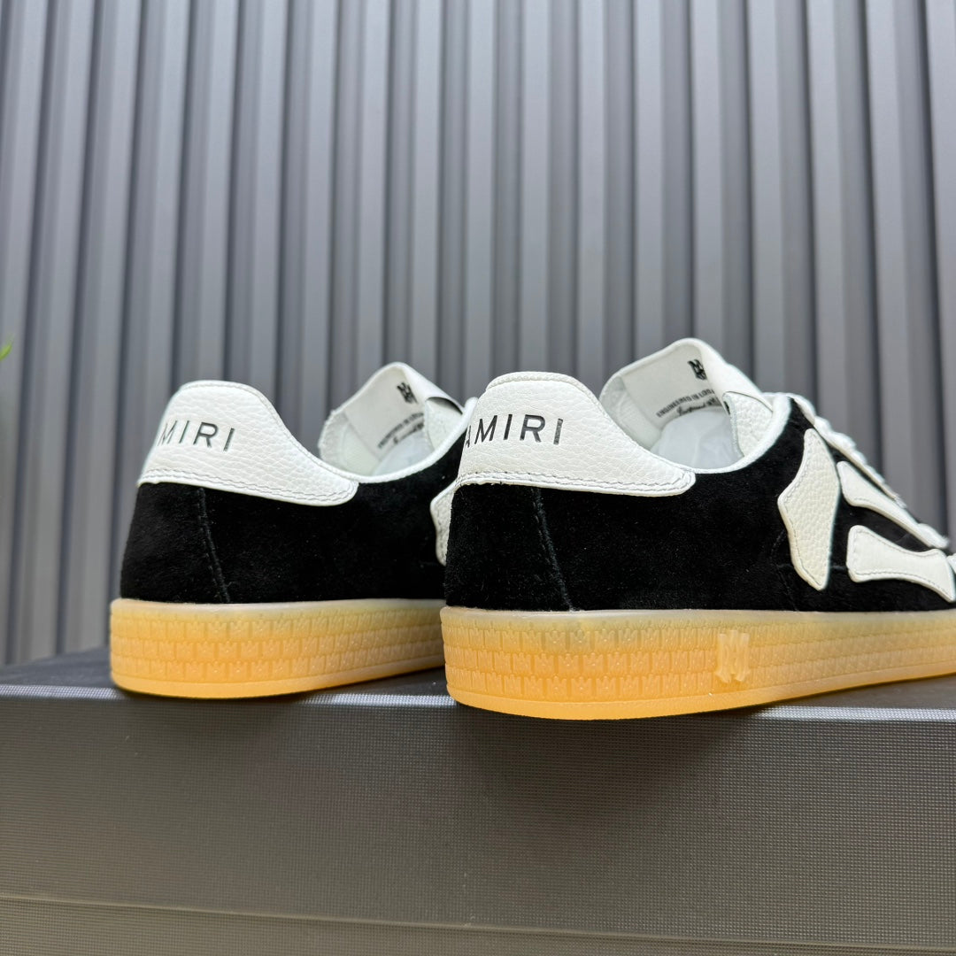 AMIRI Black Low-Top Sneakers with White Bone Details and Gum Sole