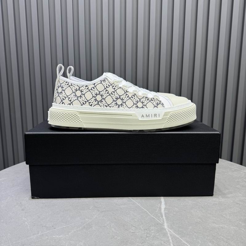 AMIRI White Low-Top Sneakers with Black Graphic Pattern