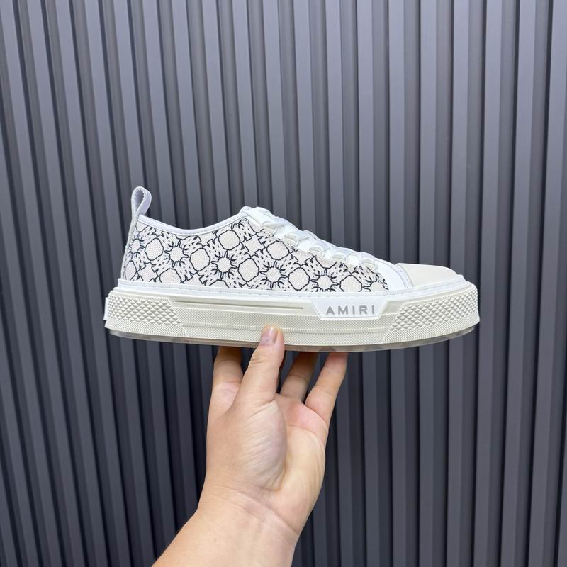 AMIRI White Low-Top Sneakers with Black Graphic Pattern
