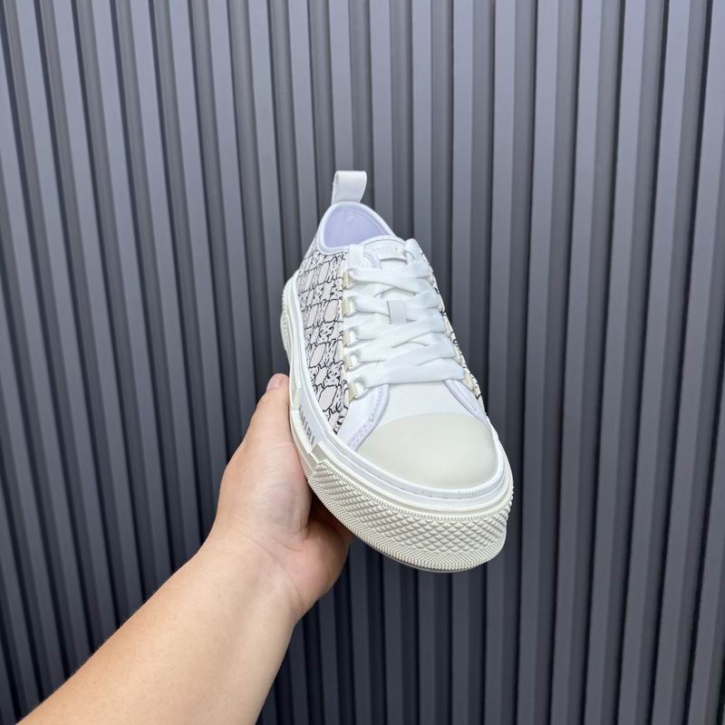 AMIRI White Low-Top Sneakers with Black Graphic Pattern