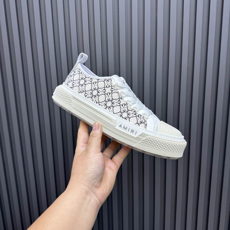 AMIRI White Low-Top Sneakers with Black Graphic Pattern