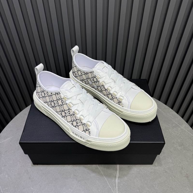 AMIRI White Low-Top Sneakers with Black Graphic Pattern