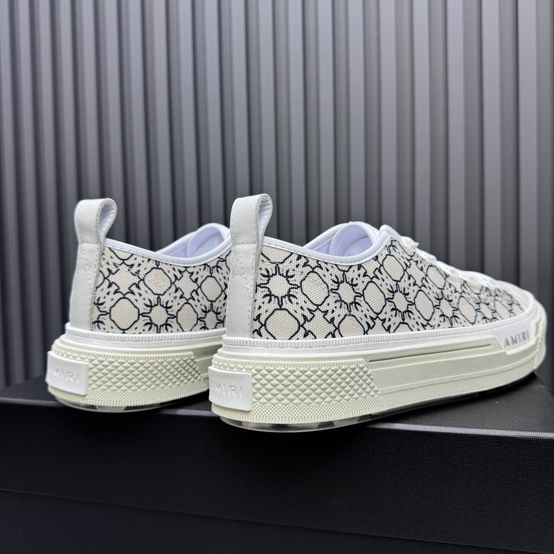 AMIRI White Low-Top Sneakers with Black Graphic Pattern