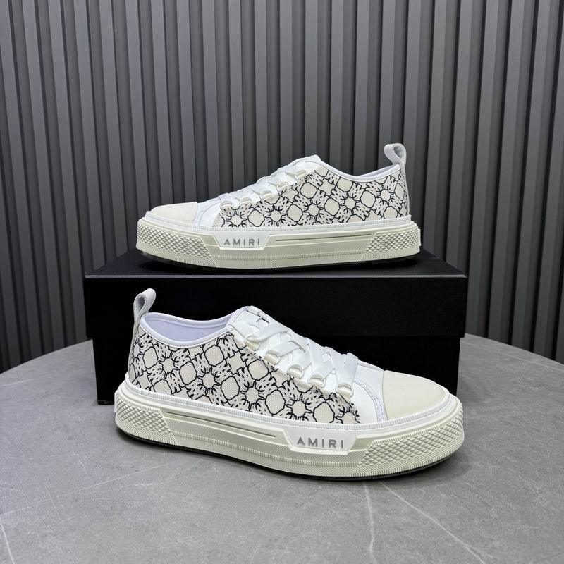 AMIRI White Low-Top Sneakers with Black Graphic Pattern