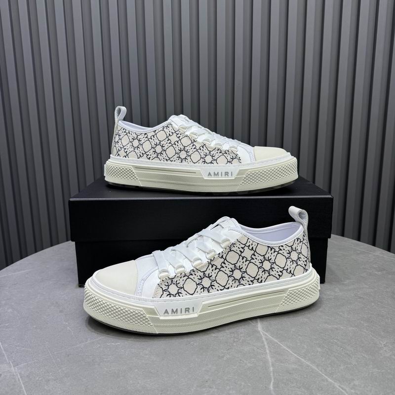AMIRI White Low-Top Sneakers with Black Graphic Pattern