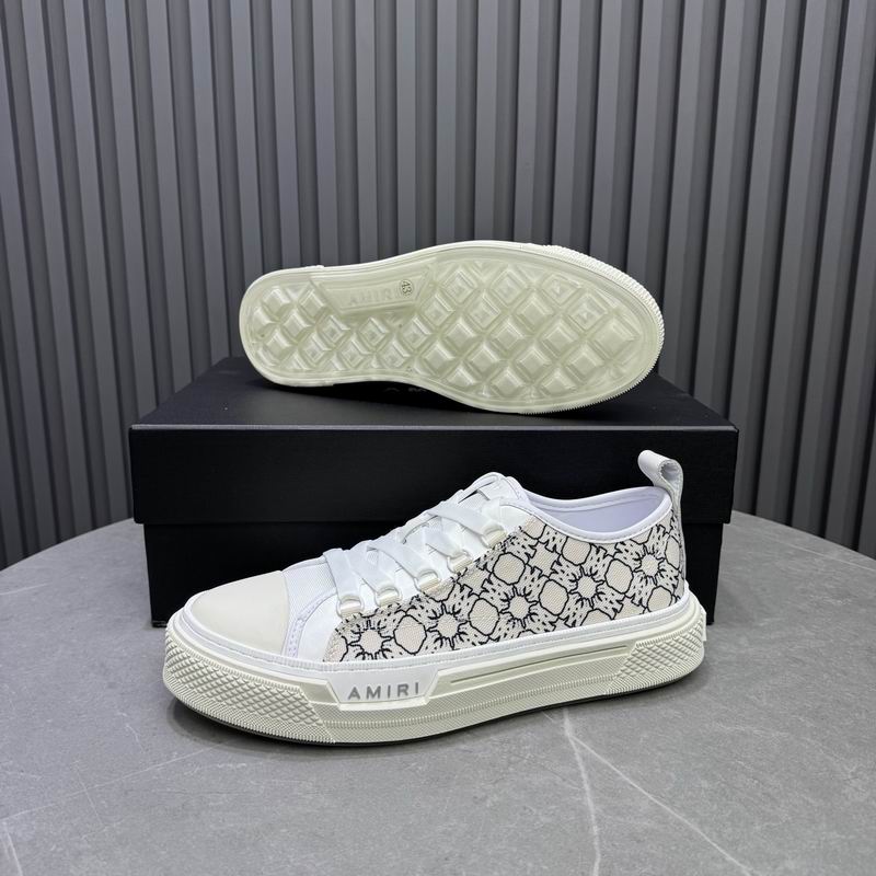 AMIRI White Low-Top Sneakers with Black Graphic Pattern