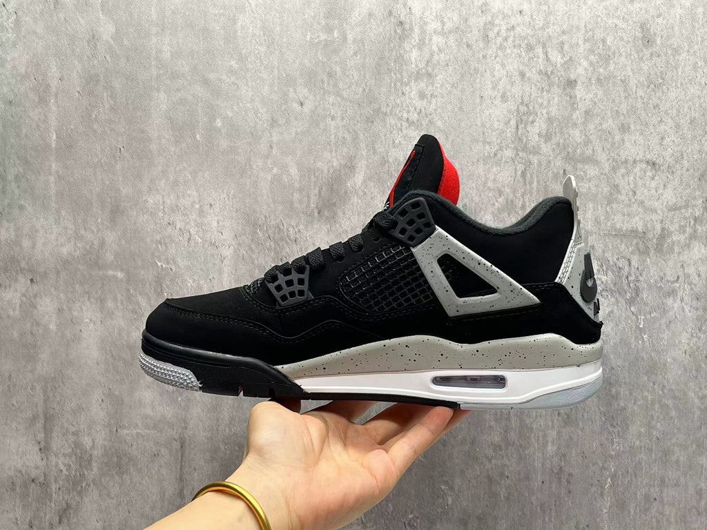 AJ4 Black & Grey Speckled Sneakers